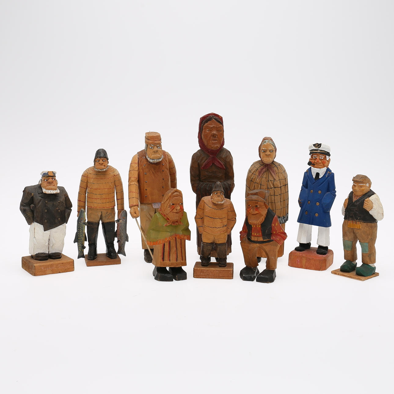 SKULPTURER, 10 st, snidat trä, mestadels Axel Ericson, signerade, 1900-tal.