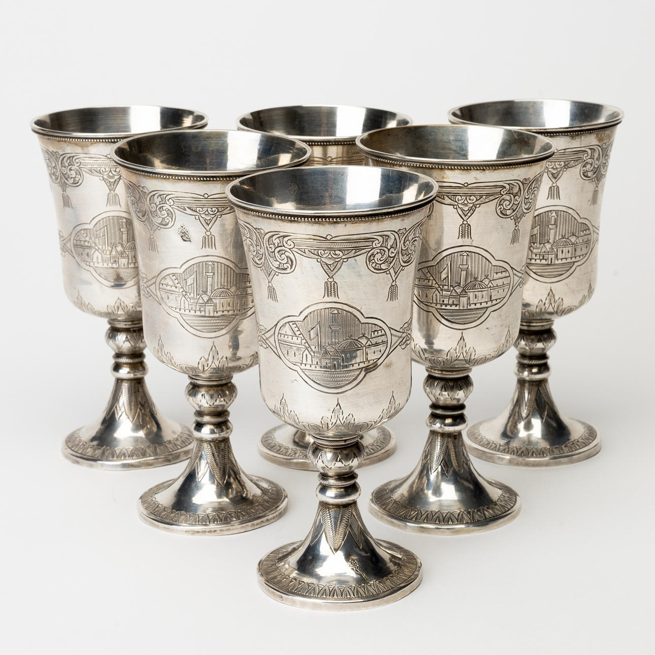 A set of six silver chalices, indistinct stamps, oriental, probably ...