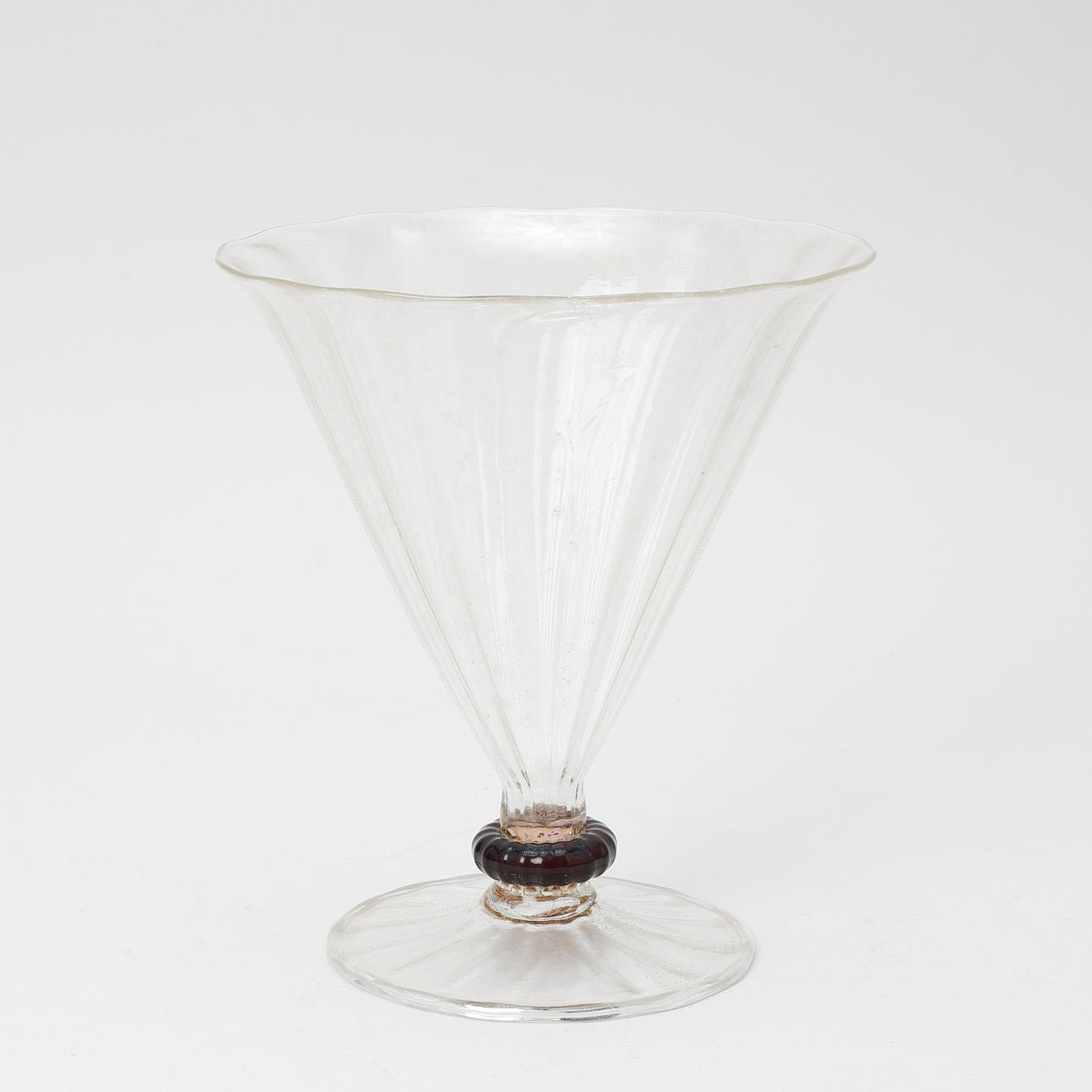 A glass vase/beaker, probably Murano.