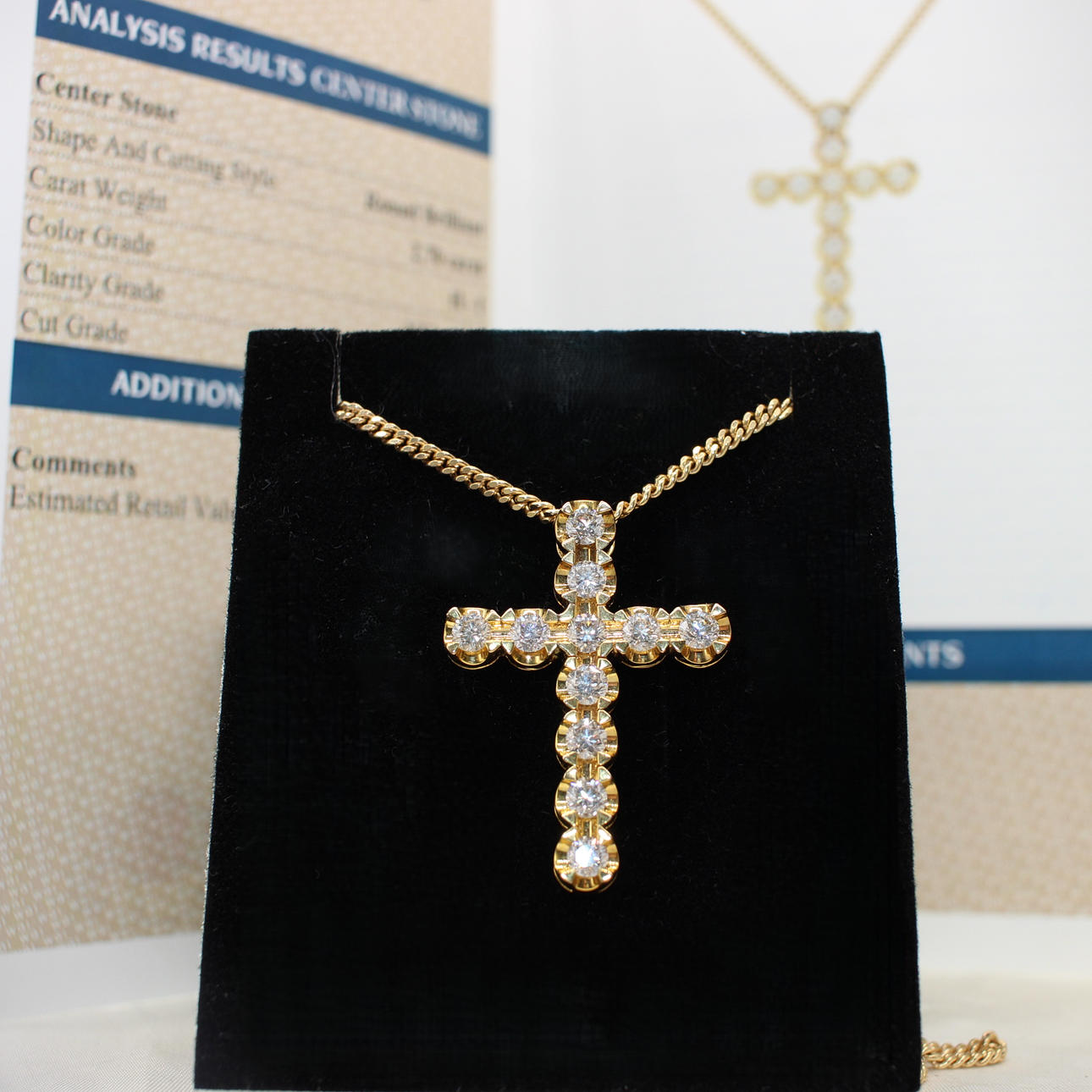 2.70CT DIAMOND CROSS NECKLACE.