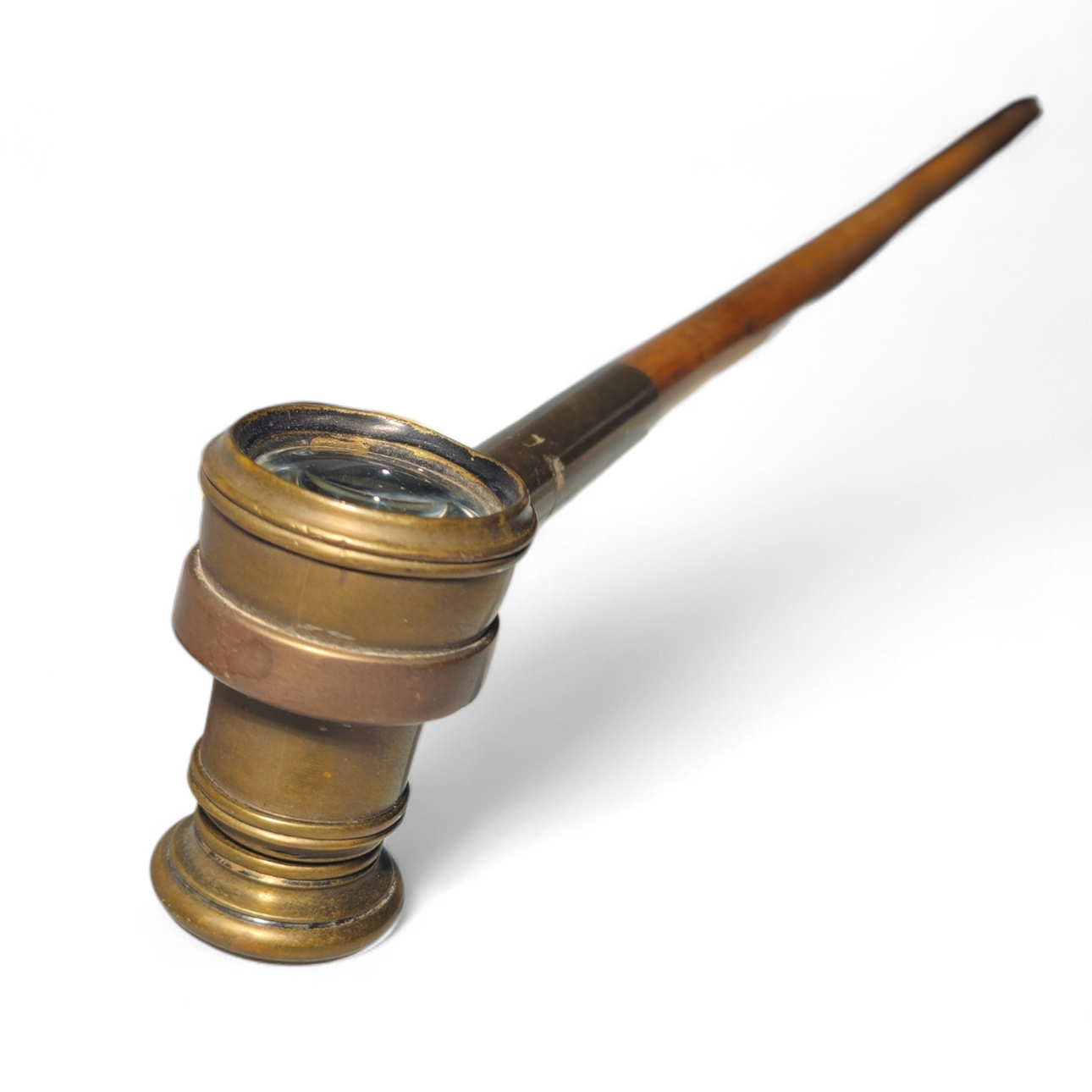 Walking stick with telescope handle in bronze.