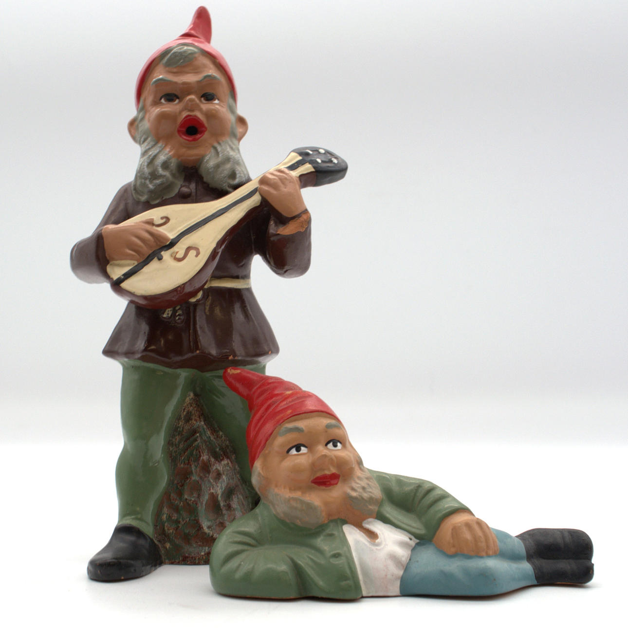 SET OF TWO PAINTED STONEWORK DWARVES, GERMANY.