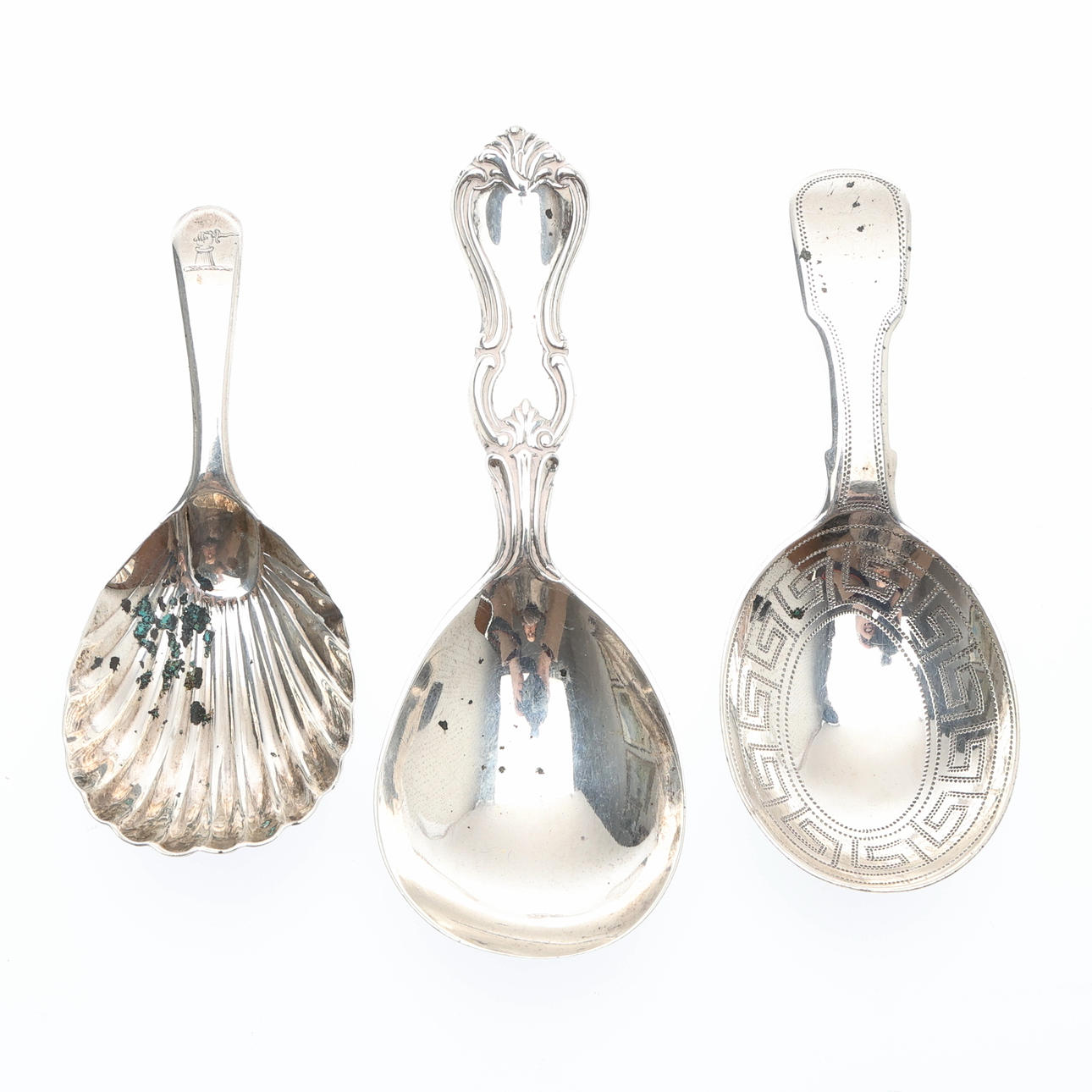 2 GEORGIAN SILVER CADDY SPOONS AND A VICTORIAN EXAMPLE. (3).