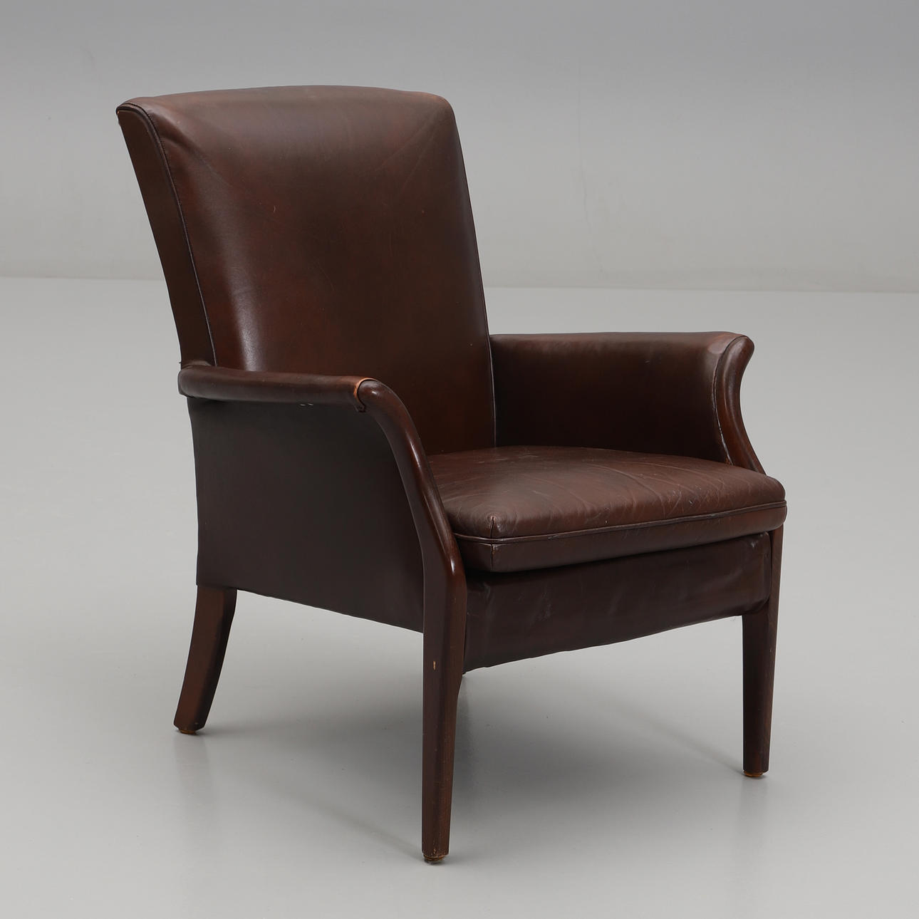 An armchair, model “PK 749-1014", Parker.