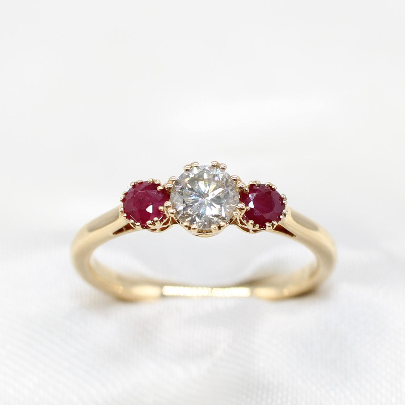 DIAMOND AND RUBY TRILOGY RING.