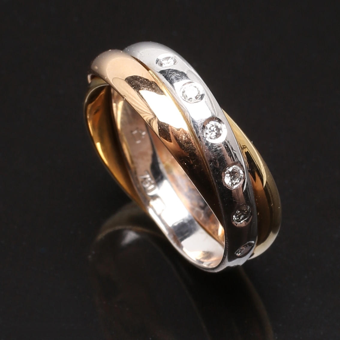 ALLIANSRING i 18 K trefärgat guld med diamanter 0,09 ct.
