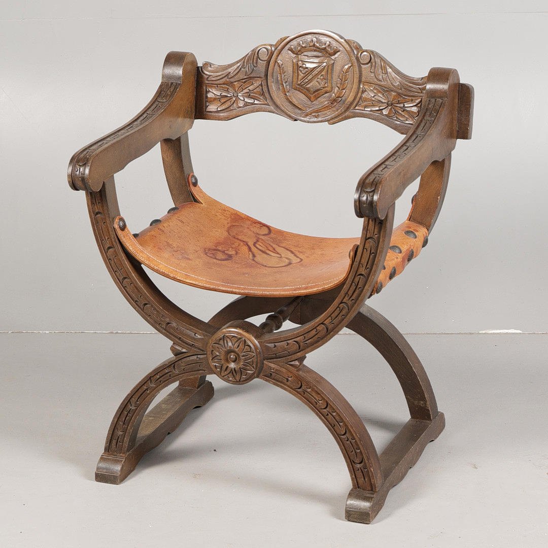 AN ITALIAN STYLE SAVONAROLA CHAIR IN THE RENAISSANCE REVIVAL MANNER ...