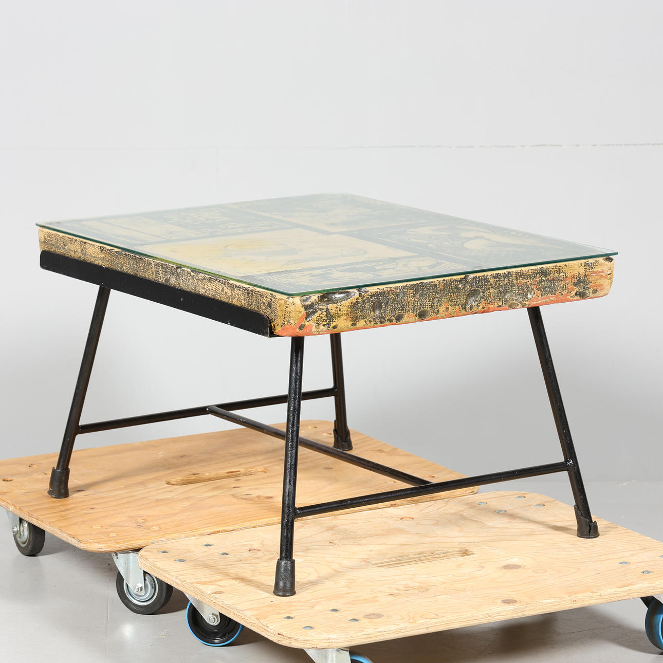 A coffee table, painted motifs, signed.