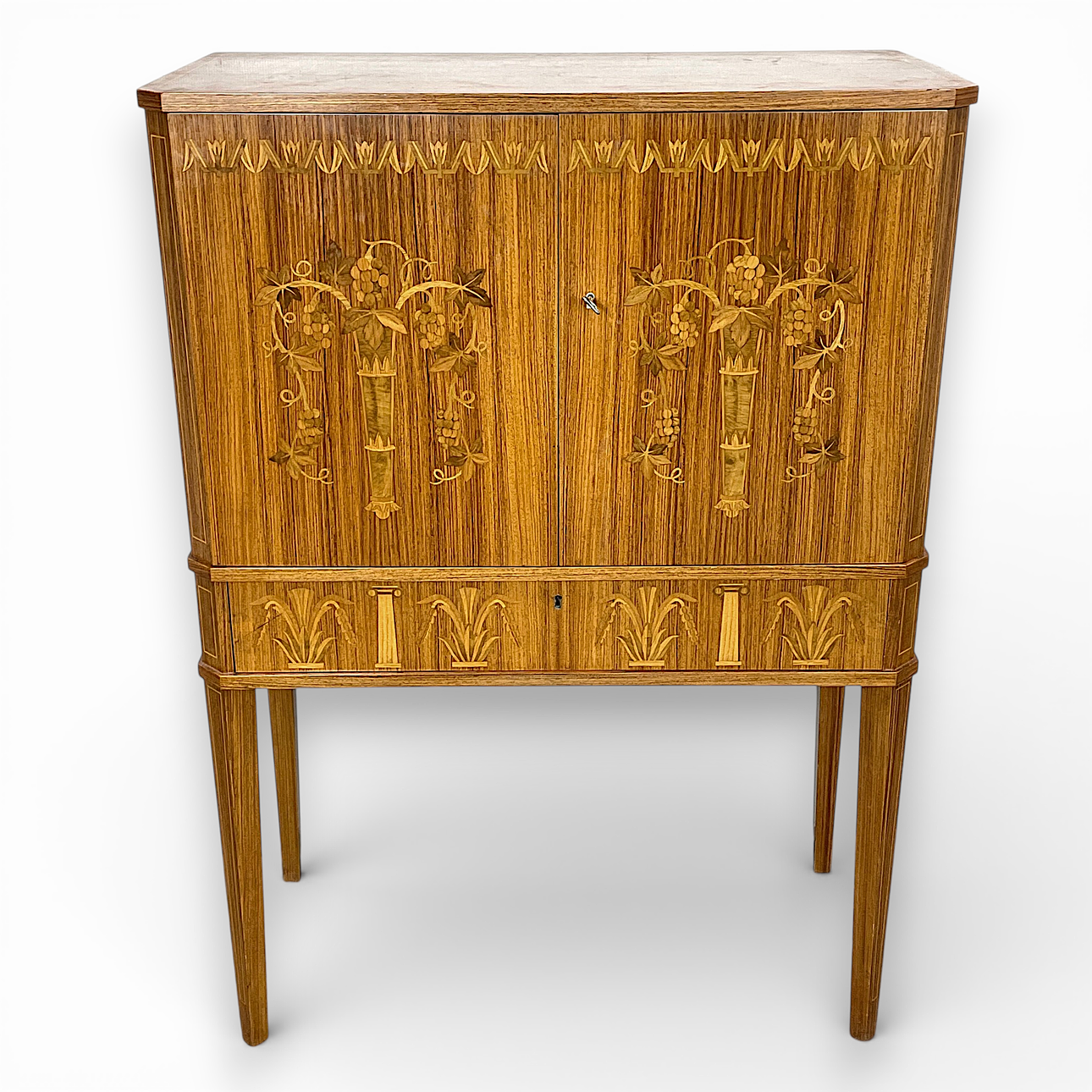 A “Druvan” jacaranda illuminated bar cabinet, Förenade Möbelfabrikarna, Linköping, circa mid 20th century.