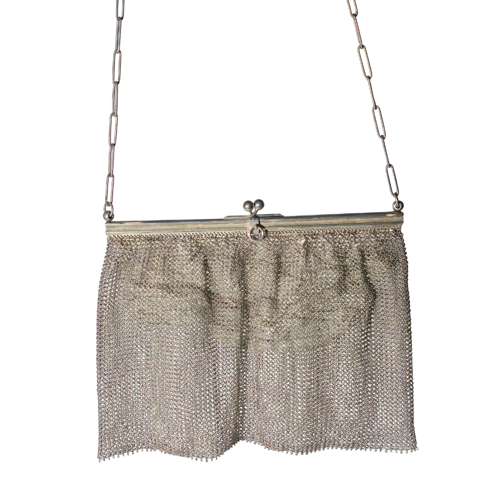 A SILVER MESH BAG.