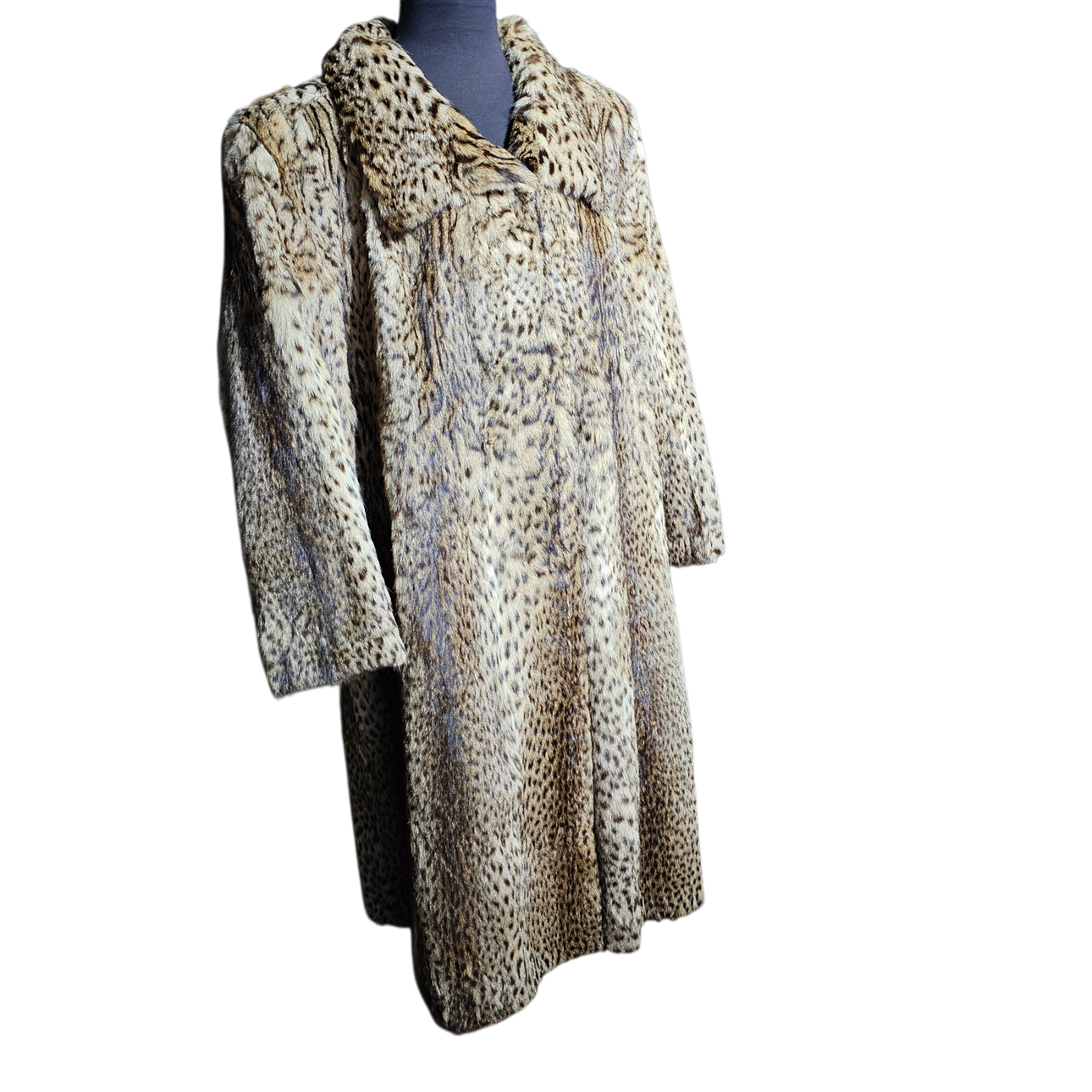 Animal print long coat with mottled fur.