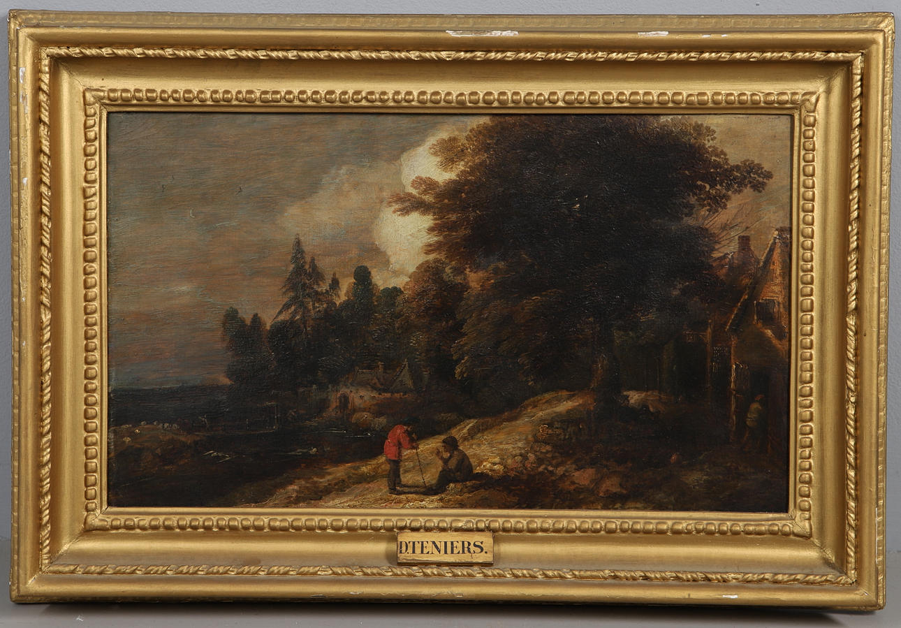 IN THE MANNER OF DAVID TENIERS THE YOUNGER (1610-1690). TRAVELLERS ON A PATH IN A WOODED RIVER LANDSCAPE.