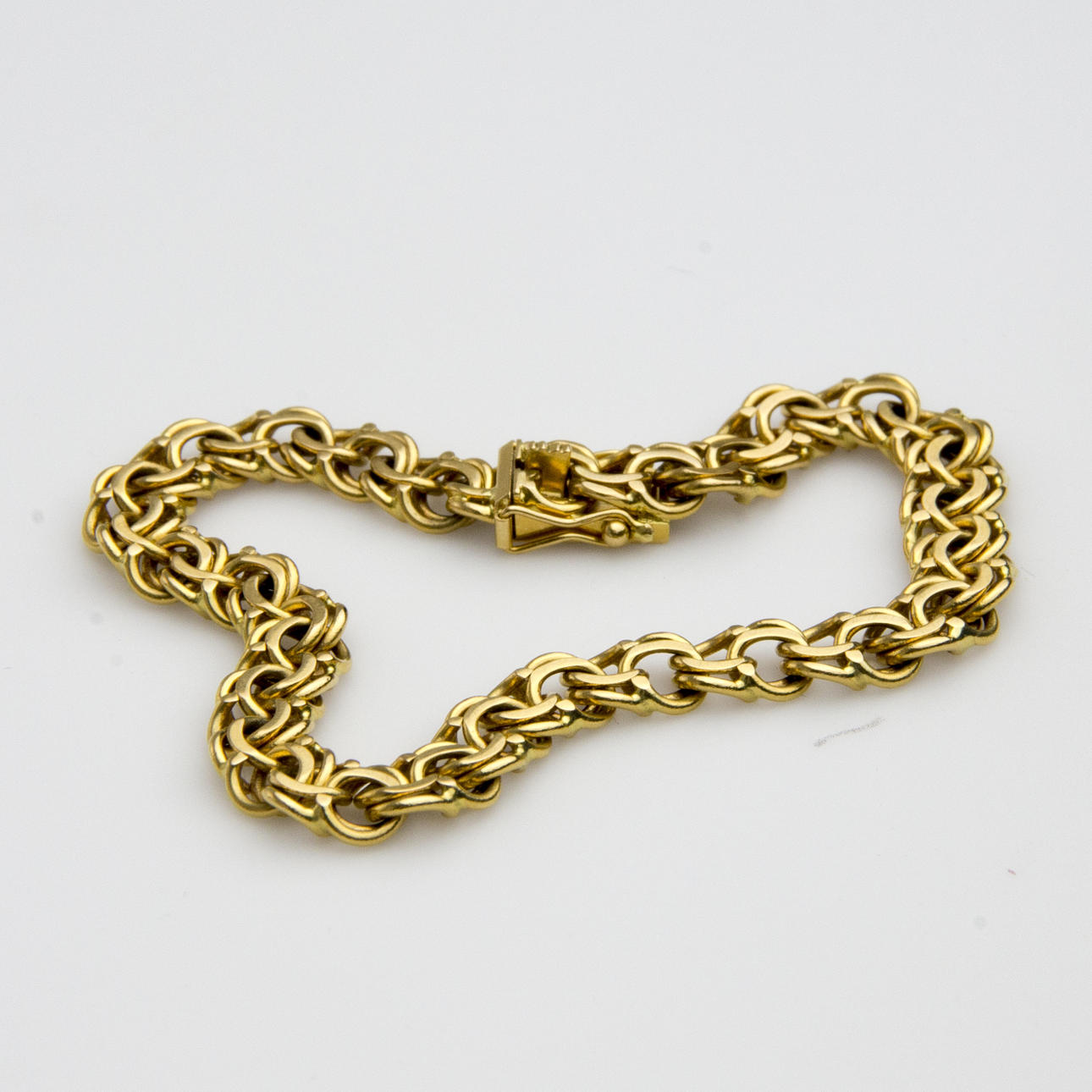 ARMBAND, 18K guld, bissmark-länk.