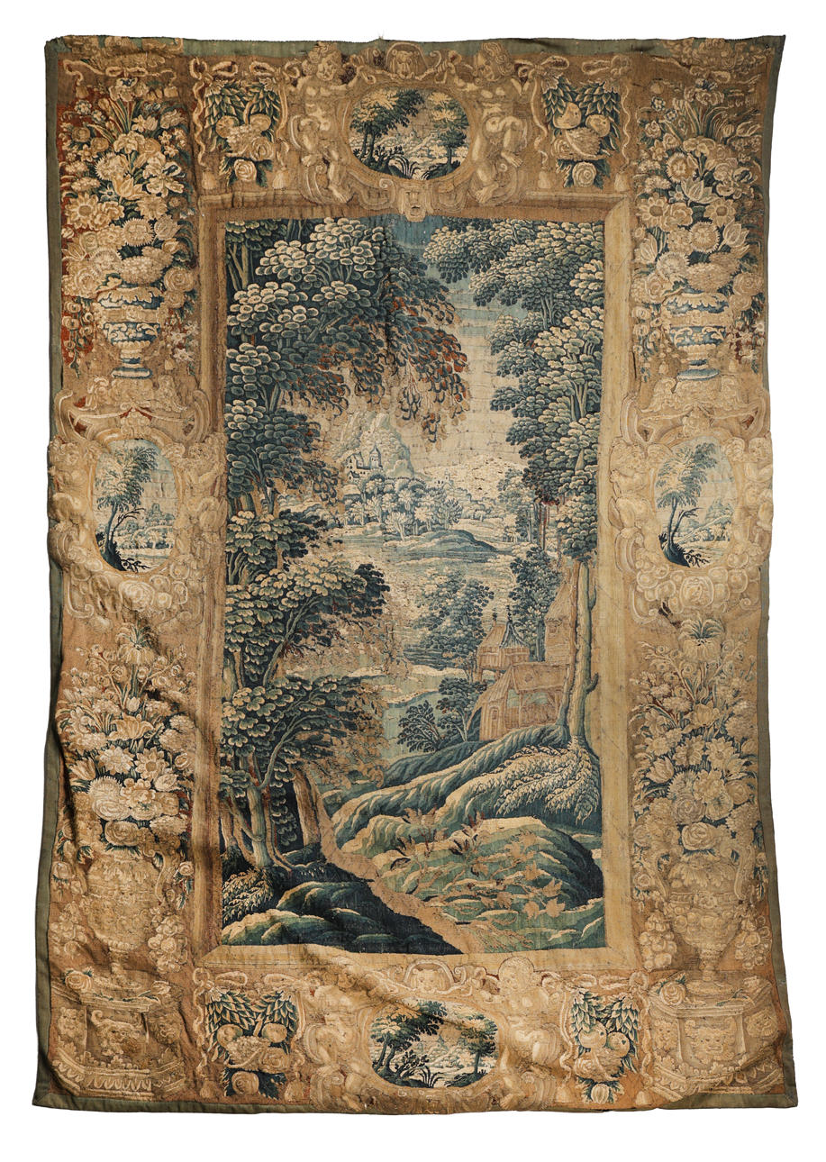 A 17TH CENTURY VERDURE TAPESTRY DEPICTING A MEANDERING FOLIATE ...
