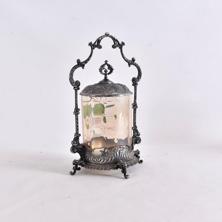BISCUIT JAR, nickel silver with enamelled glass insert.