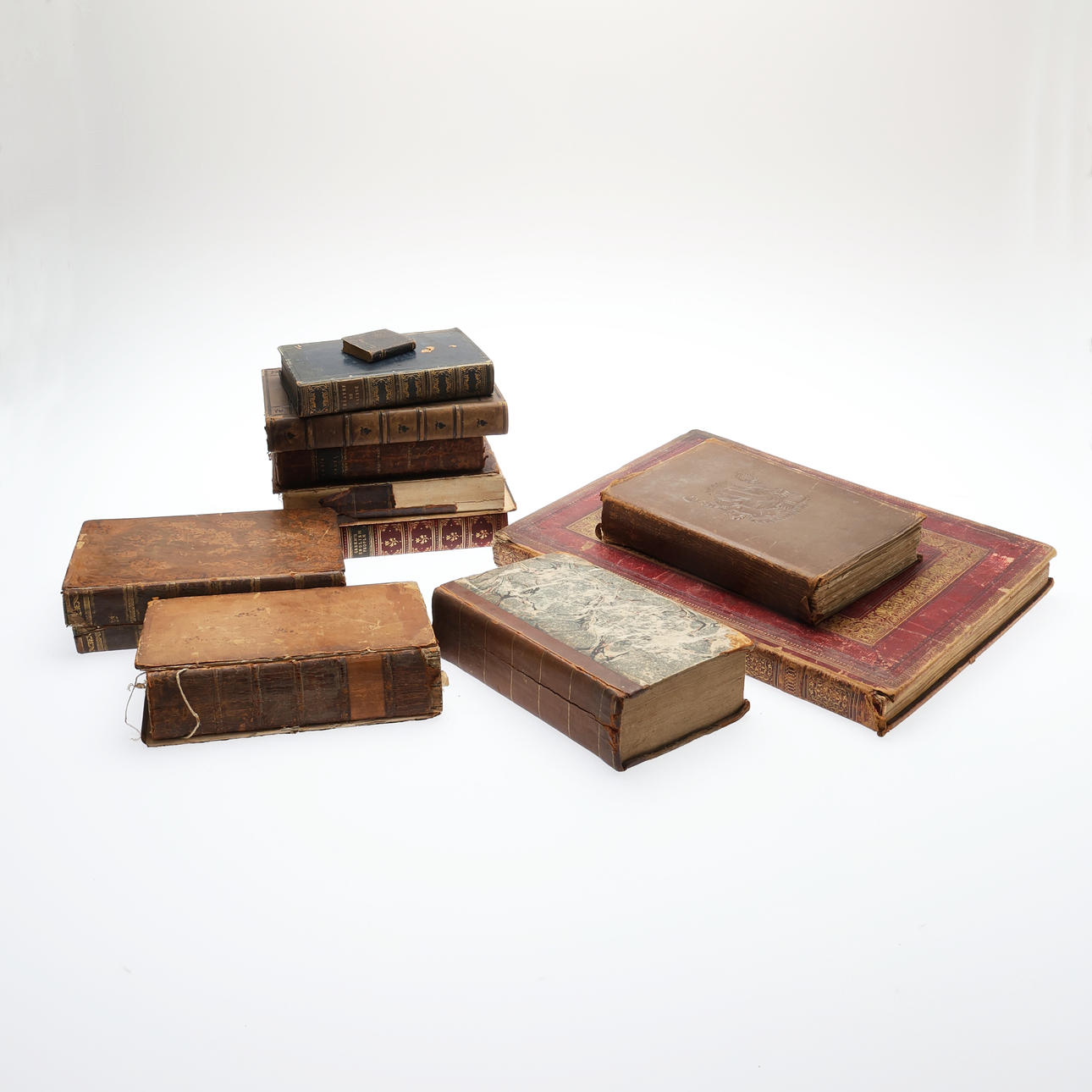 11 LEATHER BOUND VOLUMES.