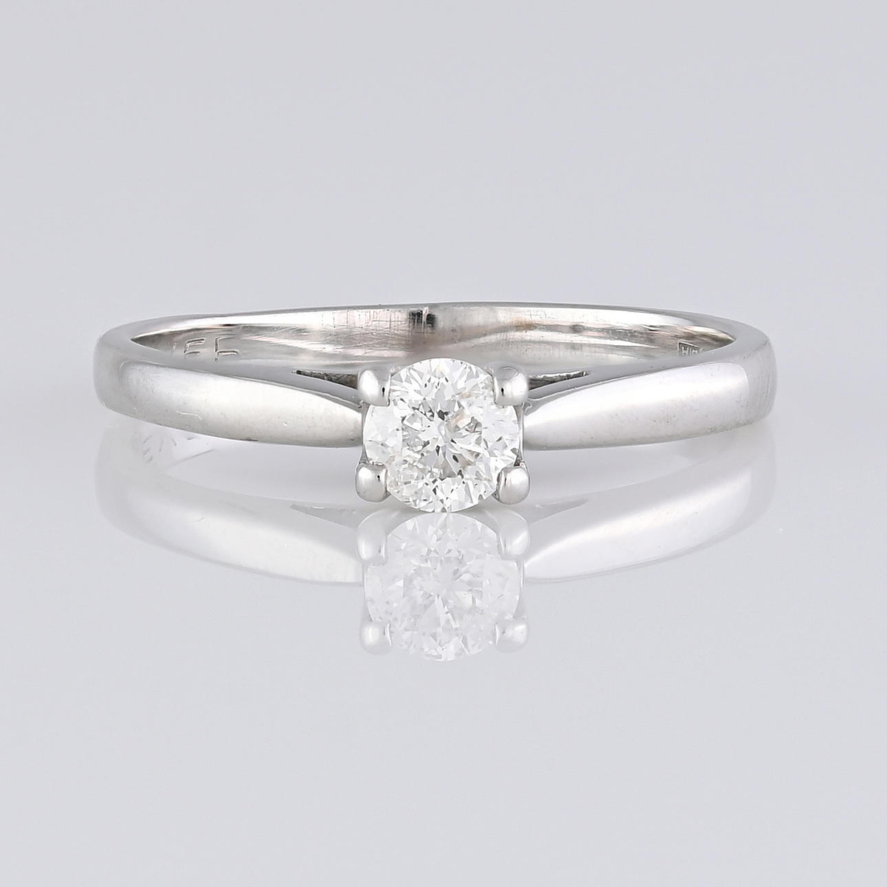 "FOREVER" DIAMOND solitaire ring.