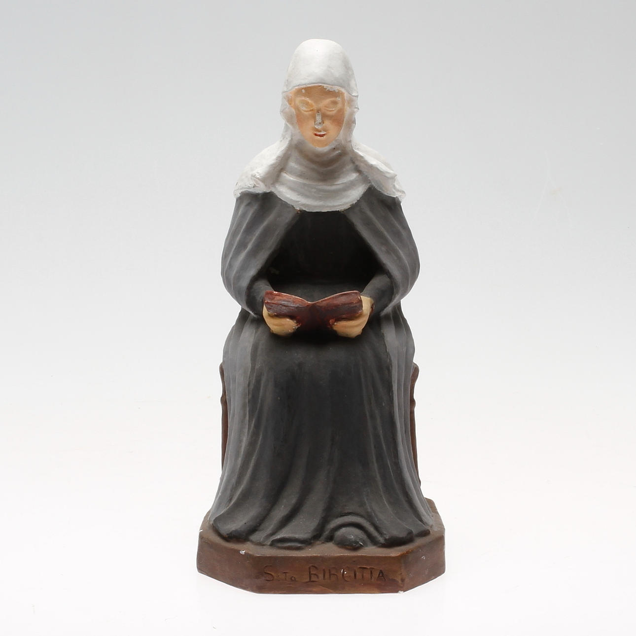 CARIN NILSON(1884-1973). "S:ta Birgitta". Skulptur, gips, signerad och daterad 1932.