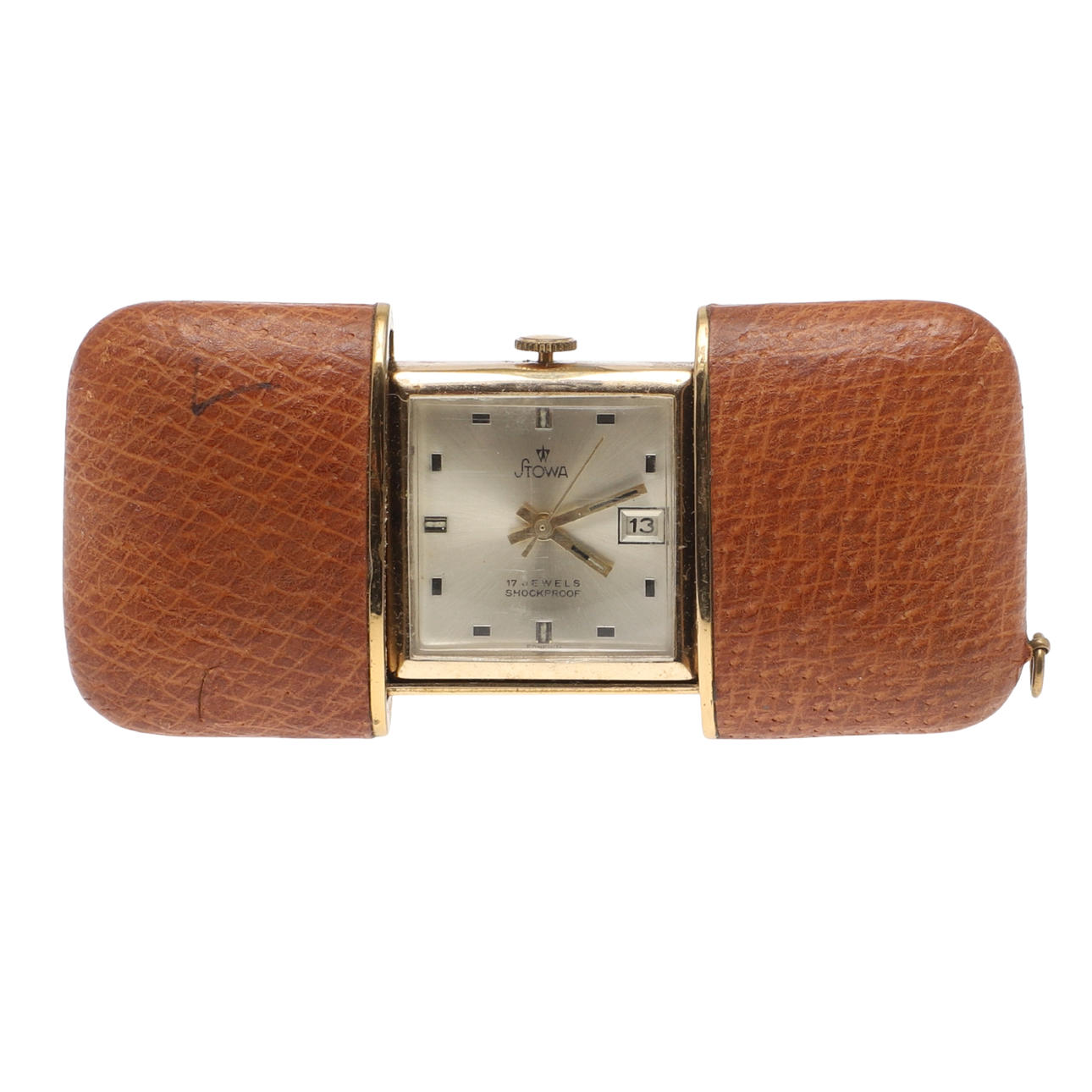 A GOLD PLATED SLIDING TRAVELLING CLOCK.