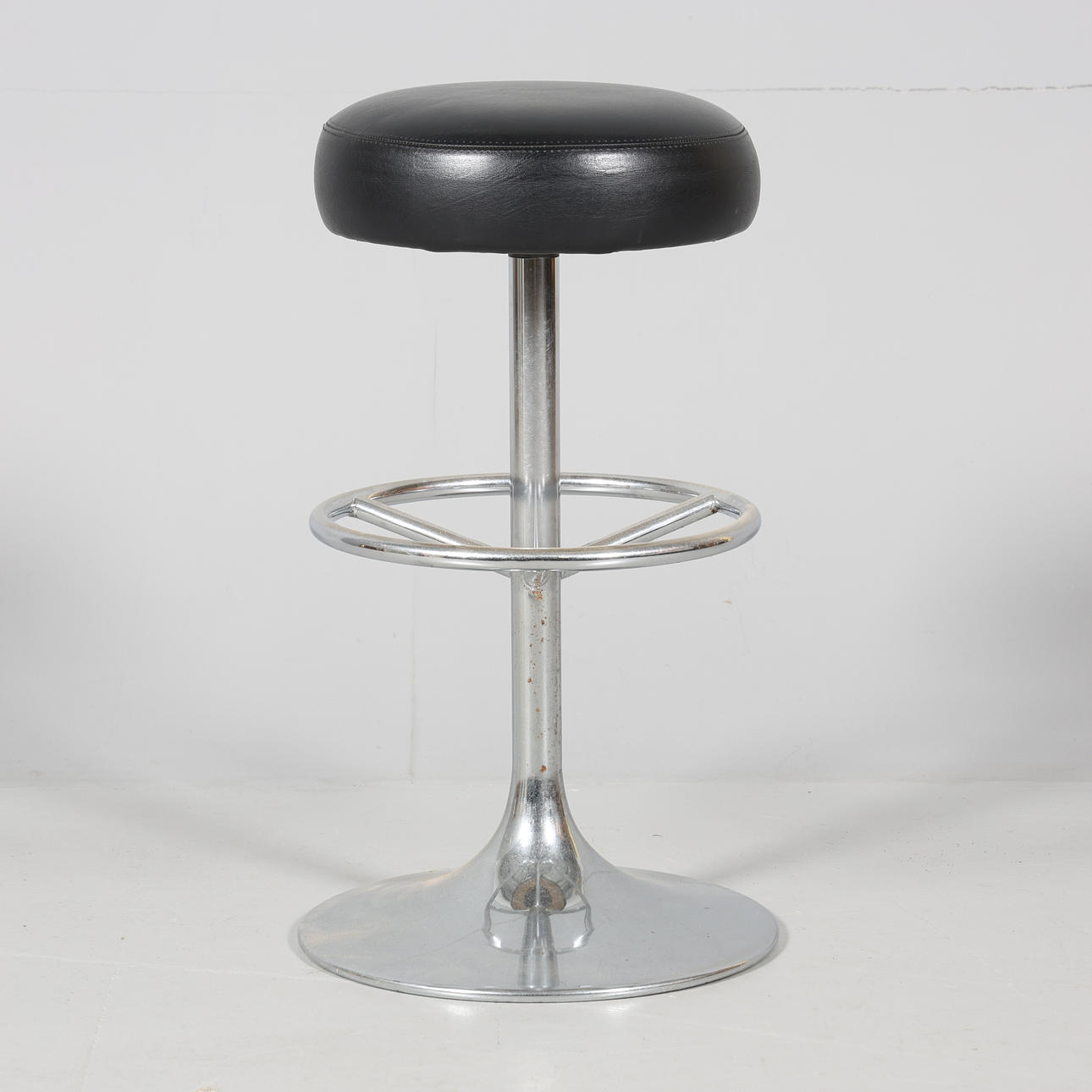 A barstool, metal and artificial leather, contemporary.