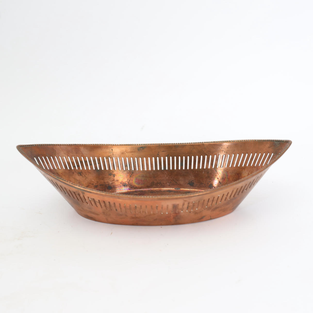 A BREAD DISH, 1800/20th century, copper.
