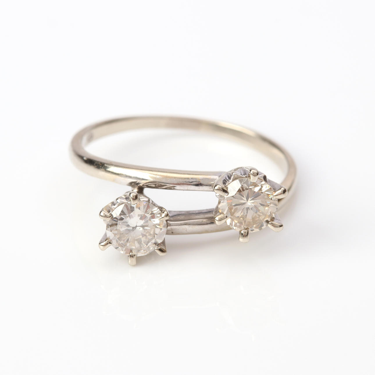 TWIN RING. 18k gold with two brilliant cut diamonds, total weight ...