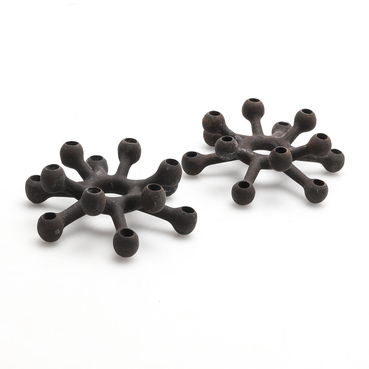 JENS  QUISTGAARD. A cast iron candlestick. 2 pcs.