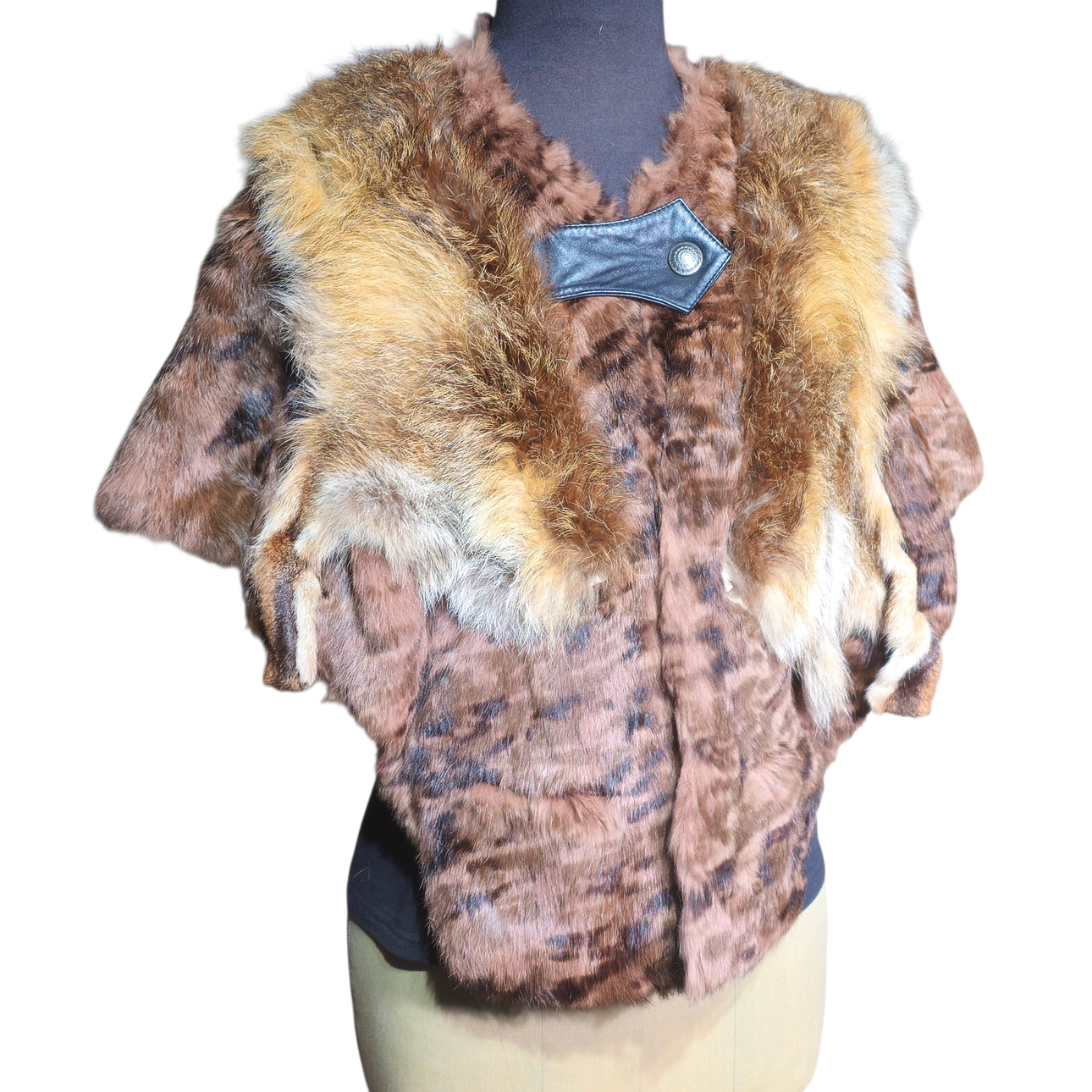 Fox and brown leather cape.