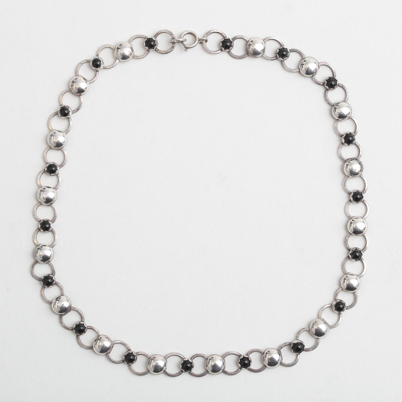 NECKLACE, silver with black pearls.