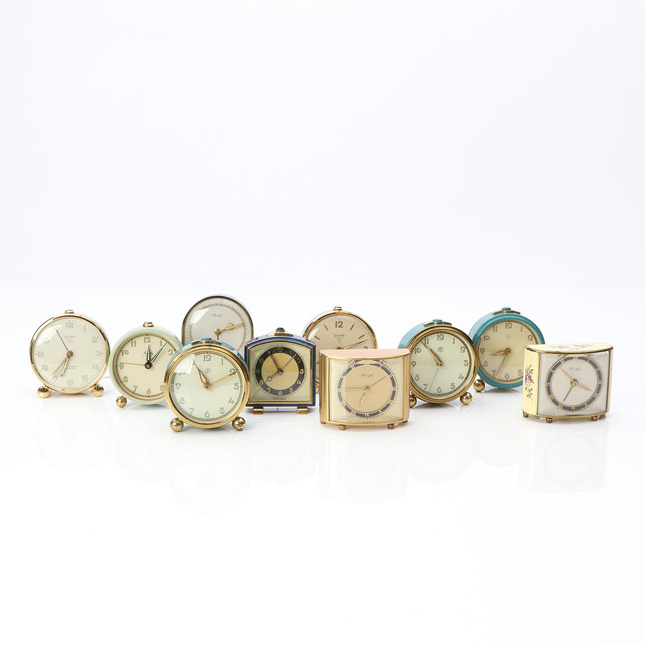 TABLE CLOCK/ALARM CLOCK, 10 PCS. Junghans, Kienzle, etc., mid 20th century.