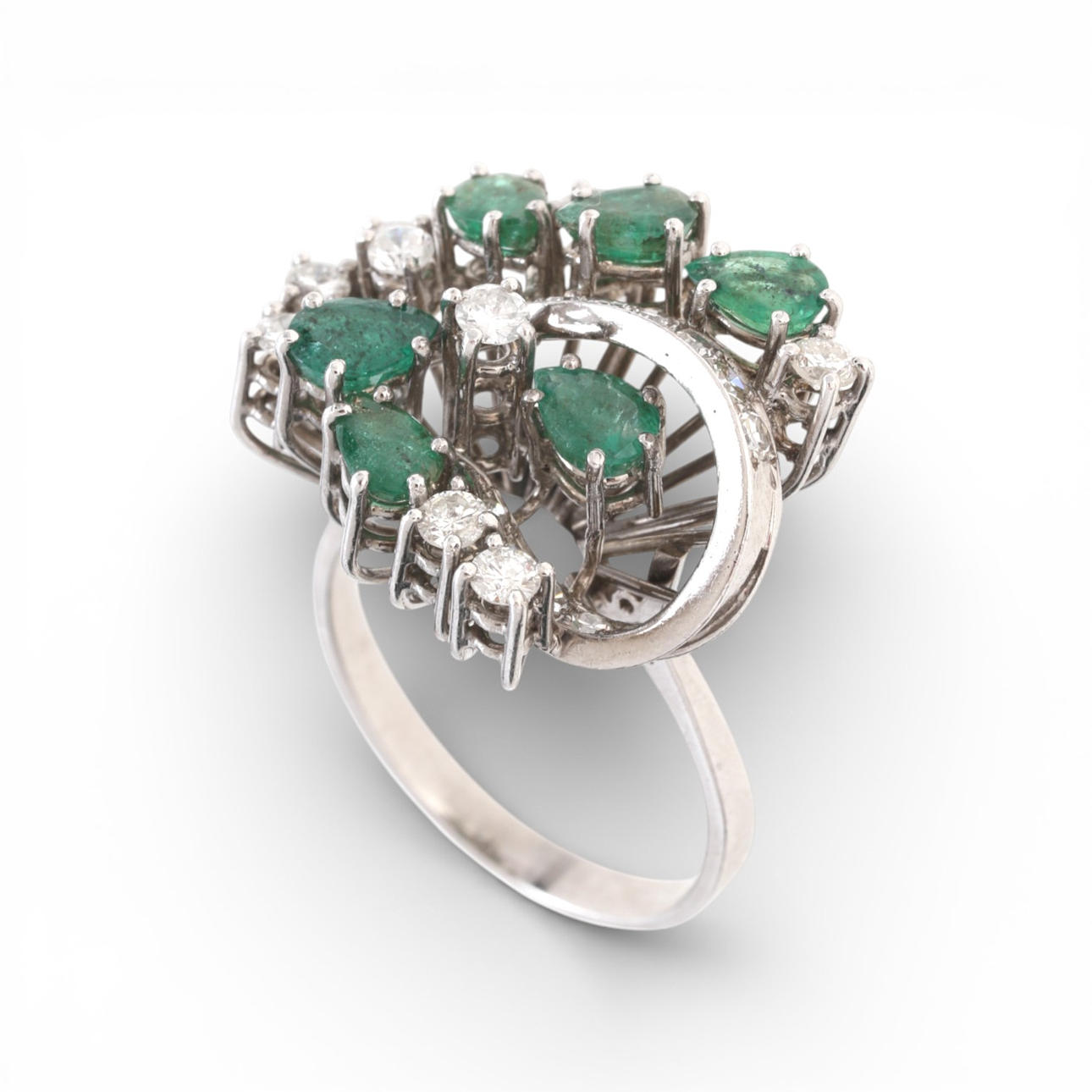 Emeralds and diamonds ring, mid 20th Century.