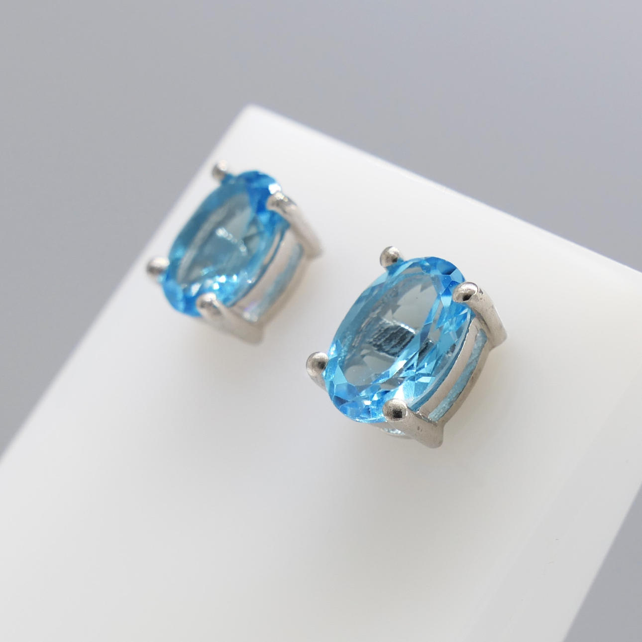 NATURAL BLUE TOPAZ ear studs.