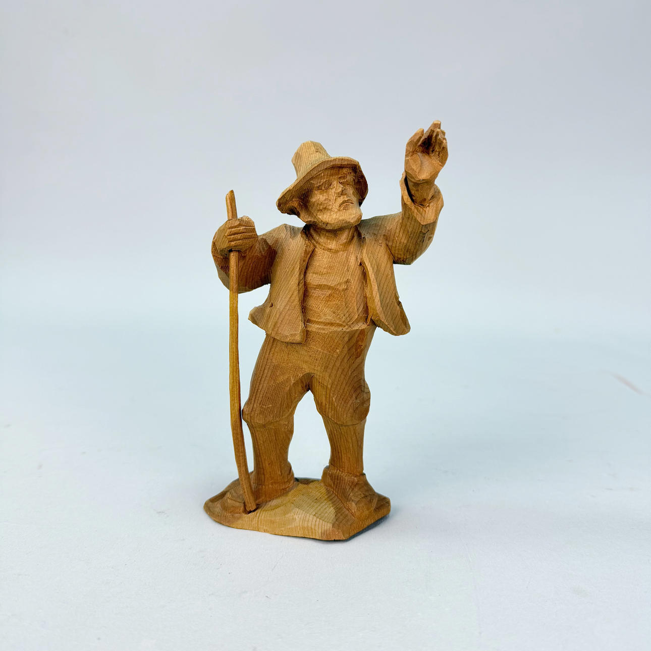 WOODEN FIGURE, stamped and signed.