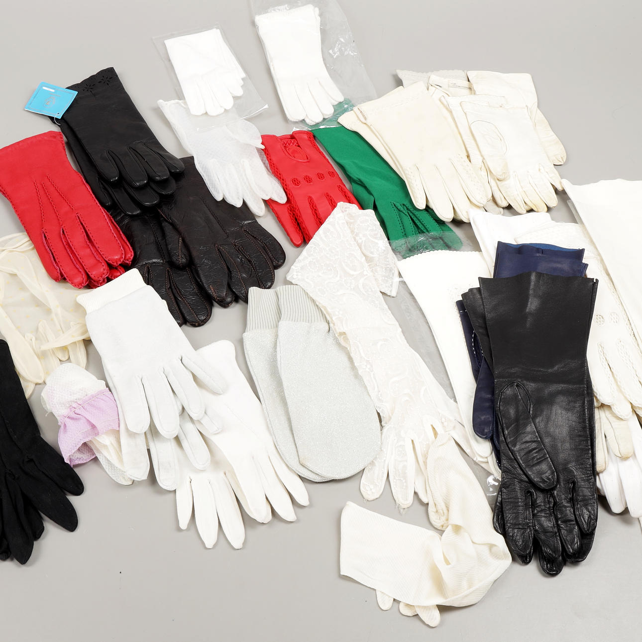 HANDSKAR, parti, skinn/textil, 1900-tal.