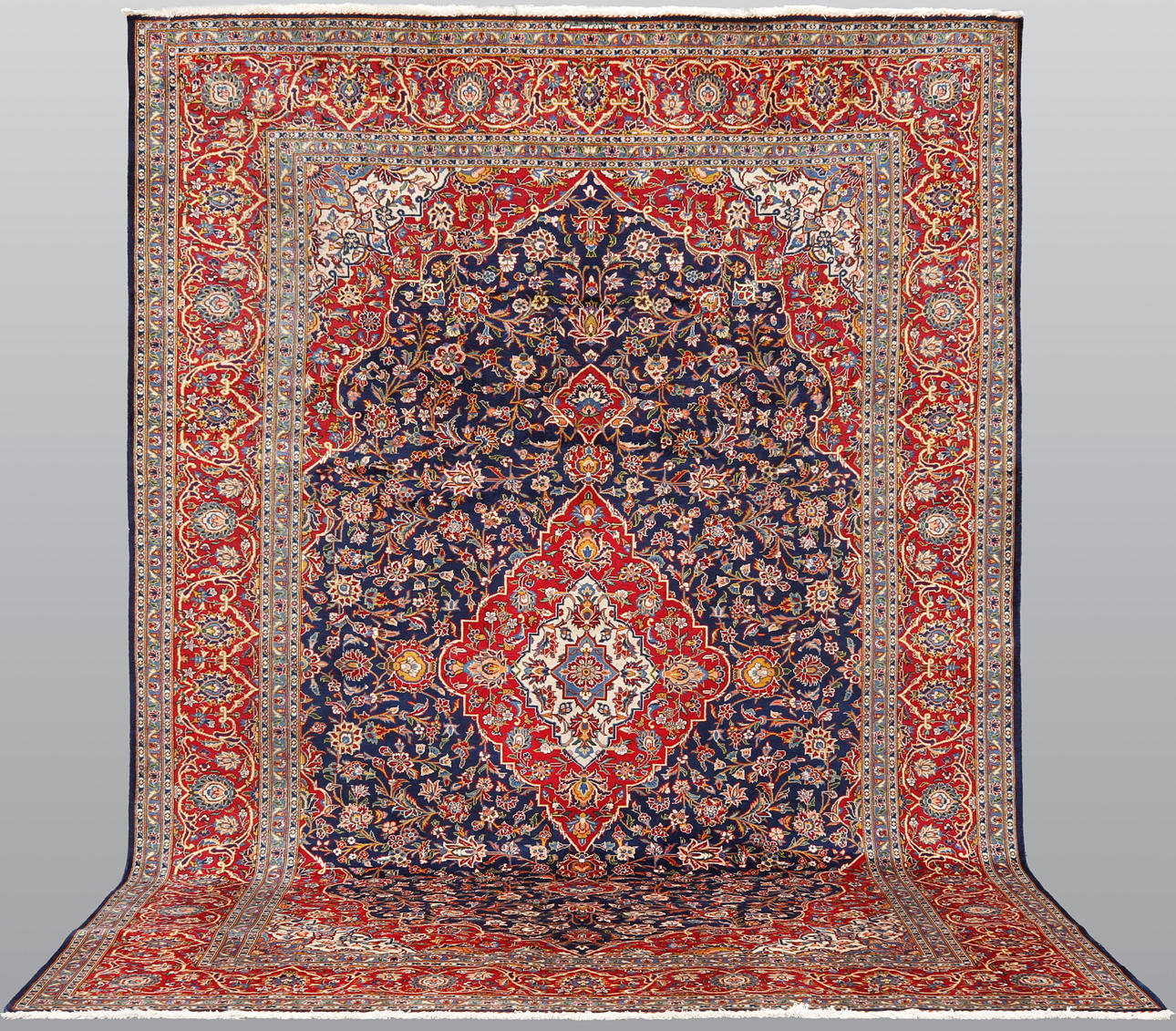 A CARPET, Keshan, signed, 392 x 272 cm.