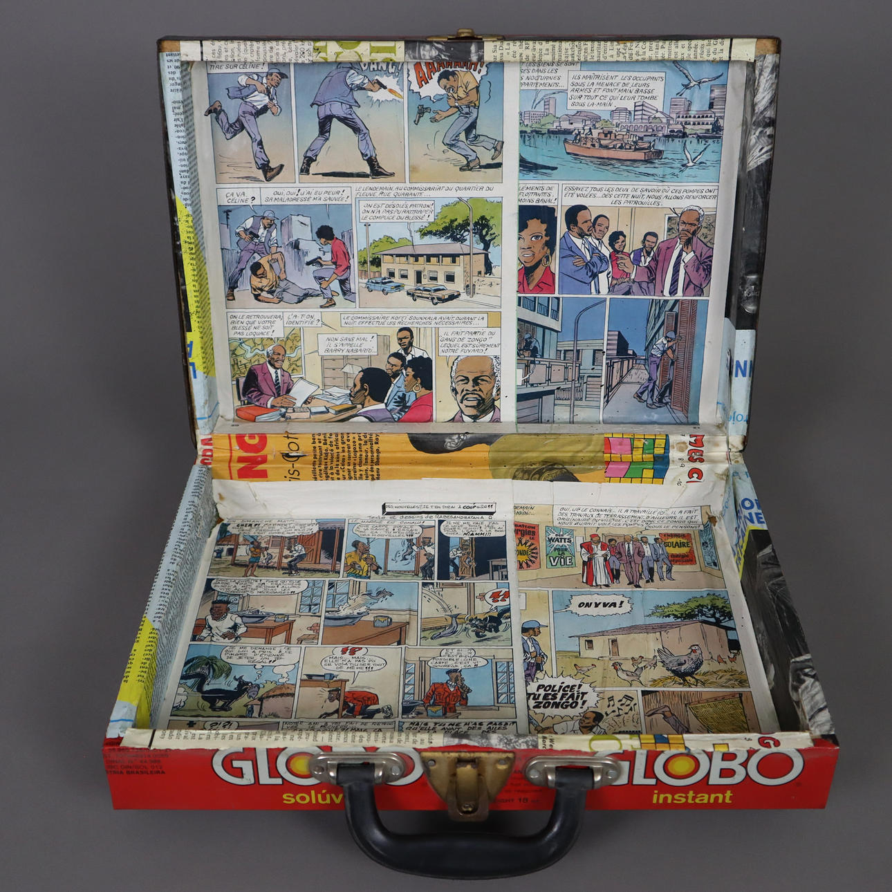OLD SUITCASE WITH COMIC ILLUSTRATIONS.