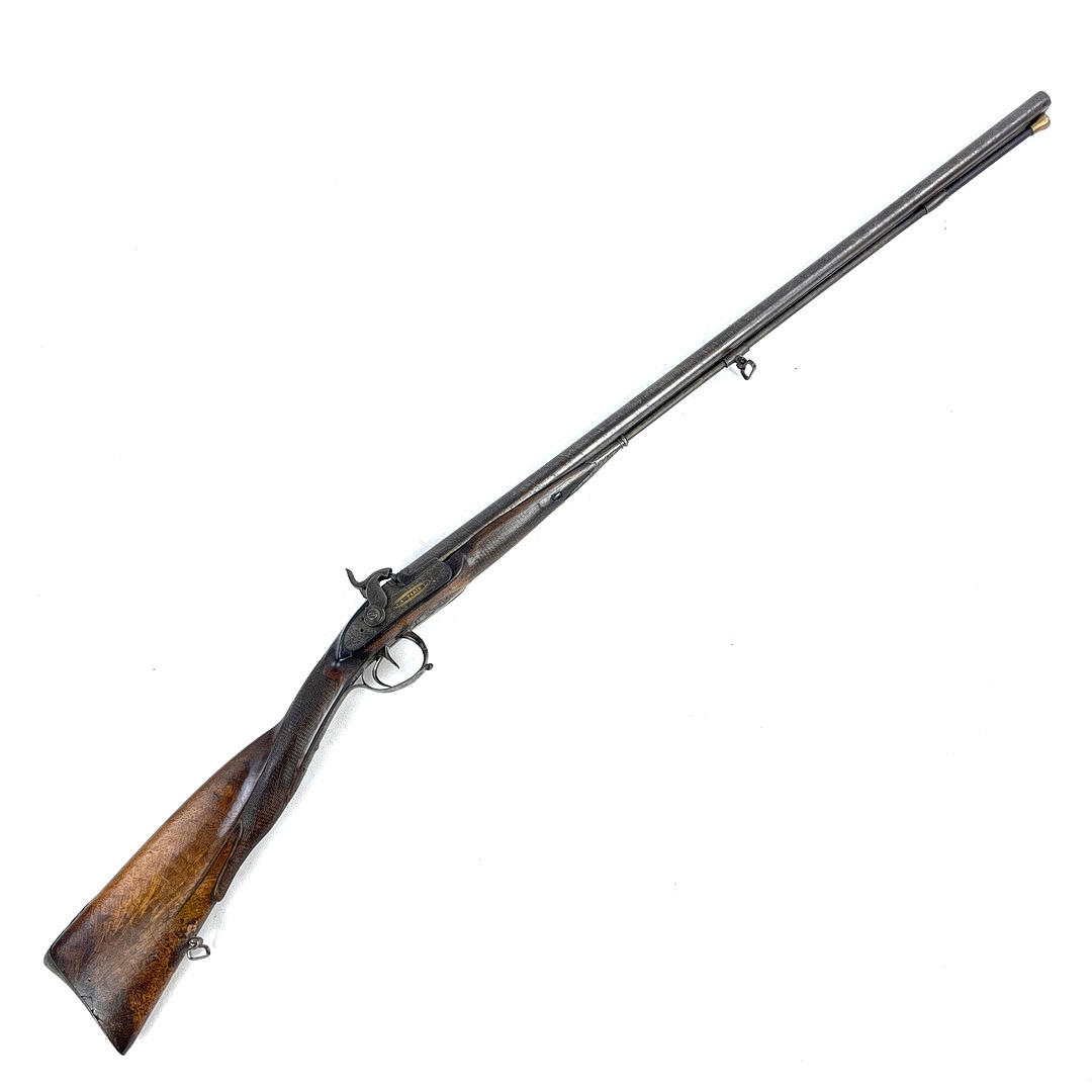 A double-barreled breech-loading rifle, marked “PICHERAU A PARIS”, 19th ...