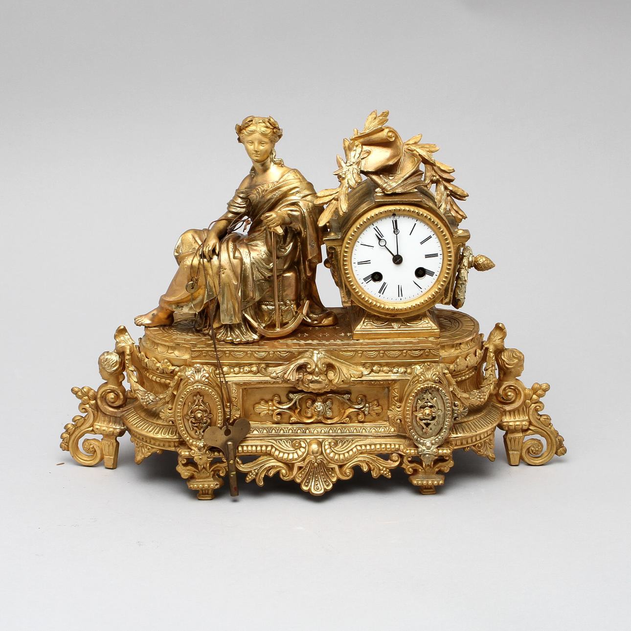 BORDSUR, förgylld metall. Nyrokoko 1800-talets slut.