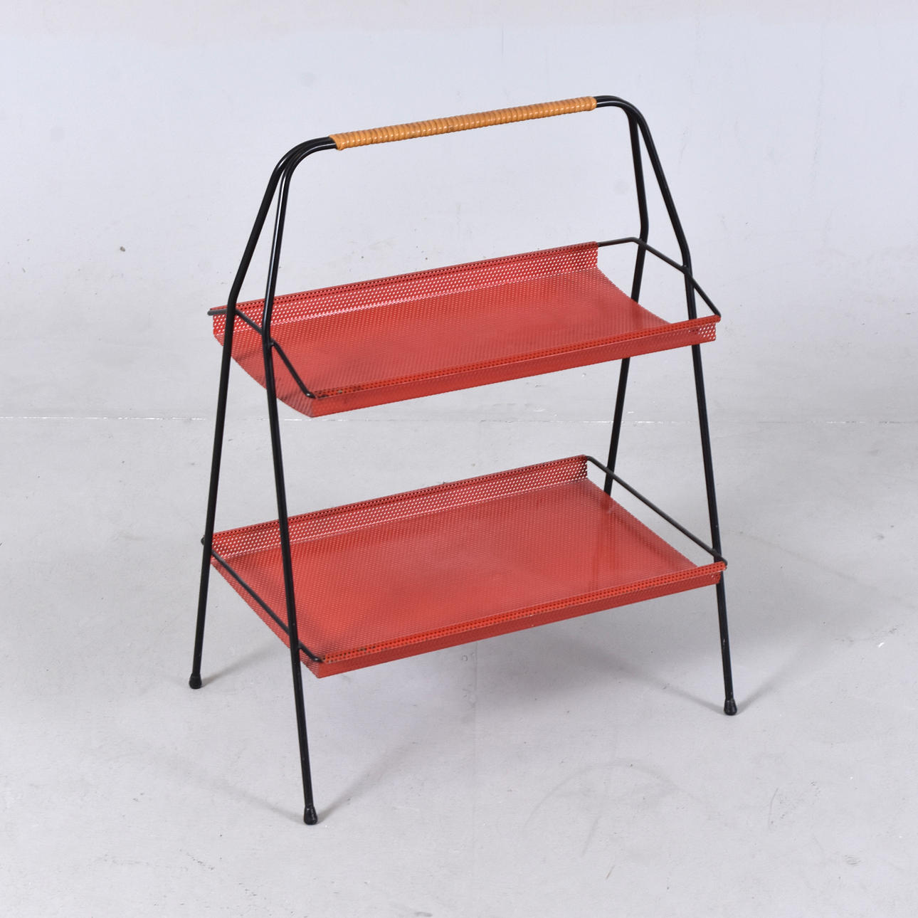 MAGAZINE TABLE/SHELF; lacquered sheet, 1950-60's.