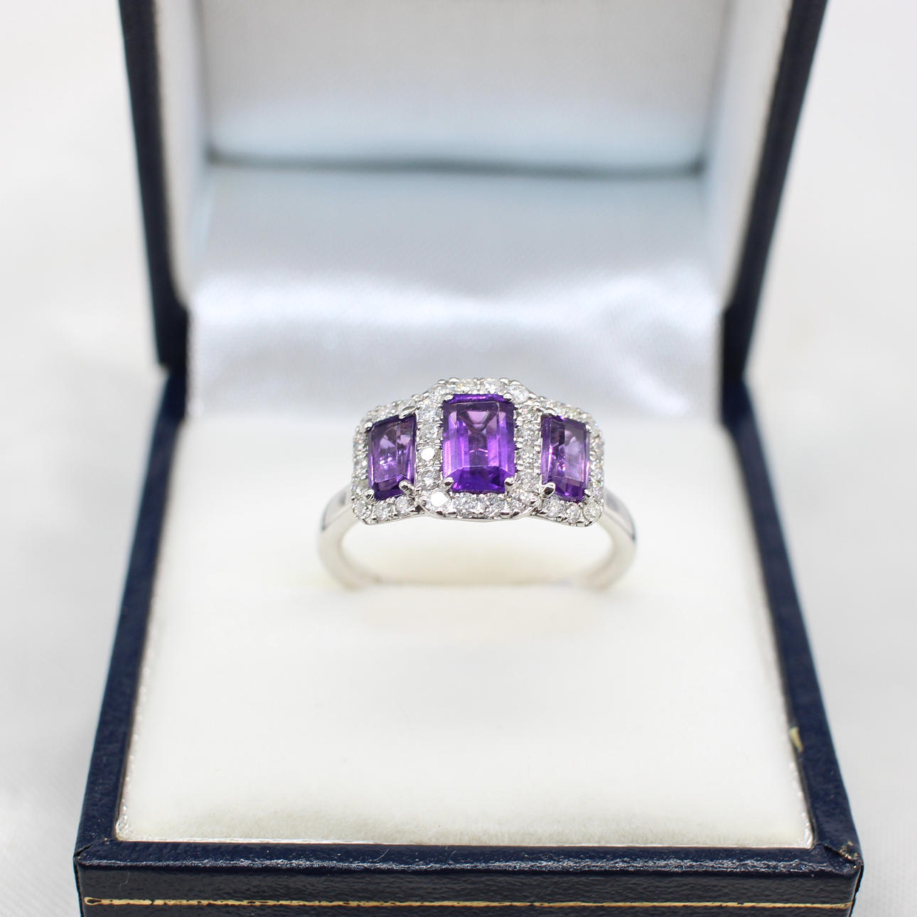 AMETHYST & DIAMOND TRILOGY CLUSTER RING.