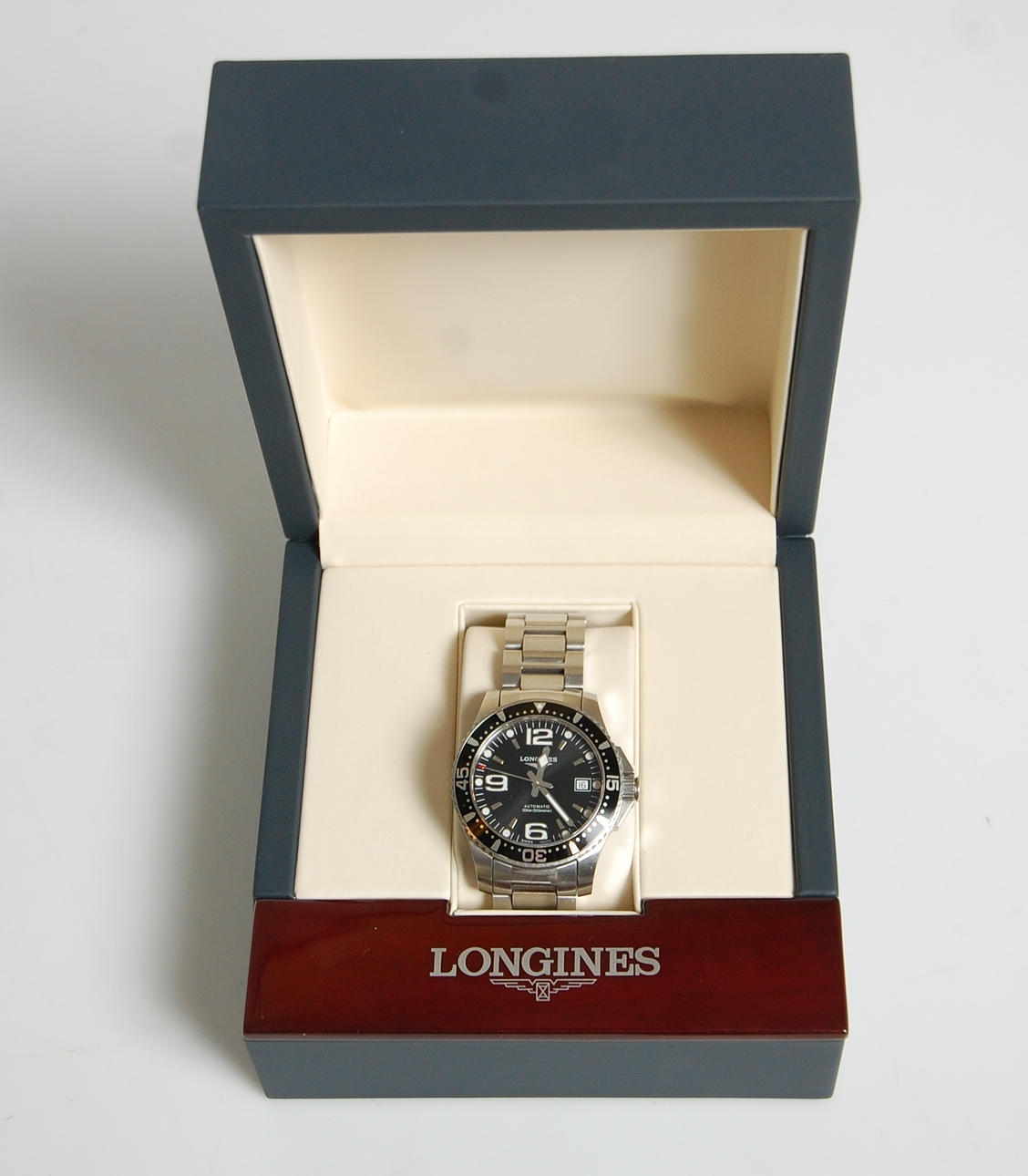 HERRARMBANDSUR, Longines Conquest, automatic.