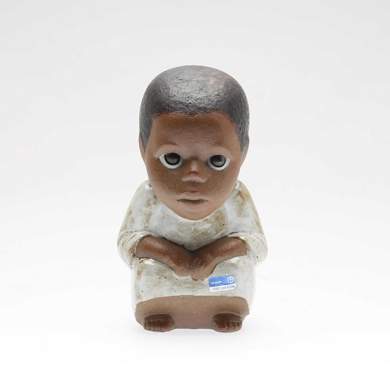 LISA LARSON. stengods, figur, "Syd Maxi", ur serien All Världens Barn, Gustavsbergs Studio.