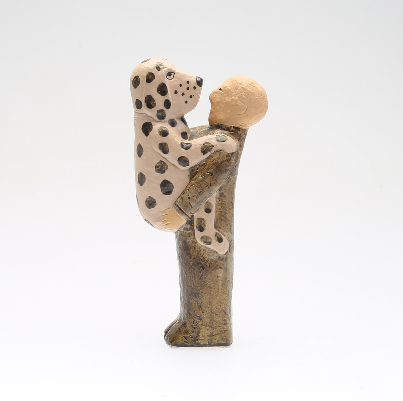 LISA LARSON. stengods, figur, "Mannen med hund", signerad och numrerad 52/600.