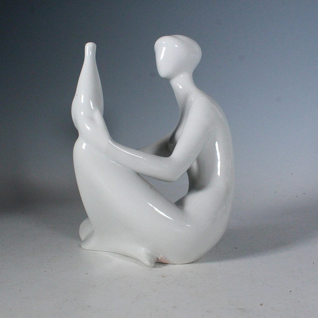 Royal DUX Jitka Forejtova, porcelain figurine, “Seated woman with