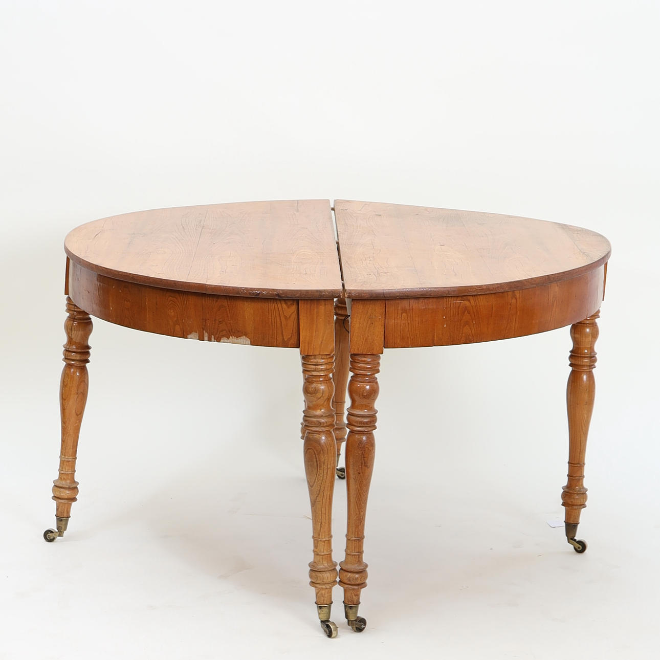 A 19th-Century Dining Table.