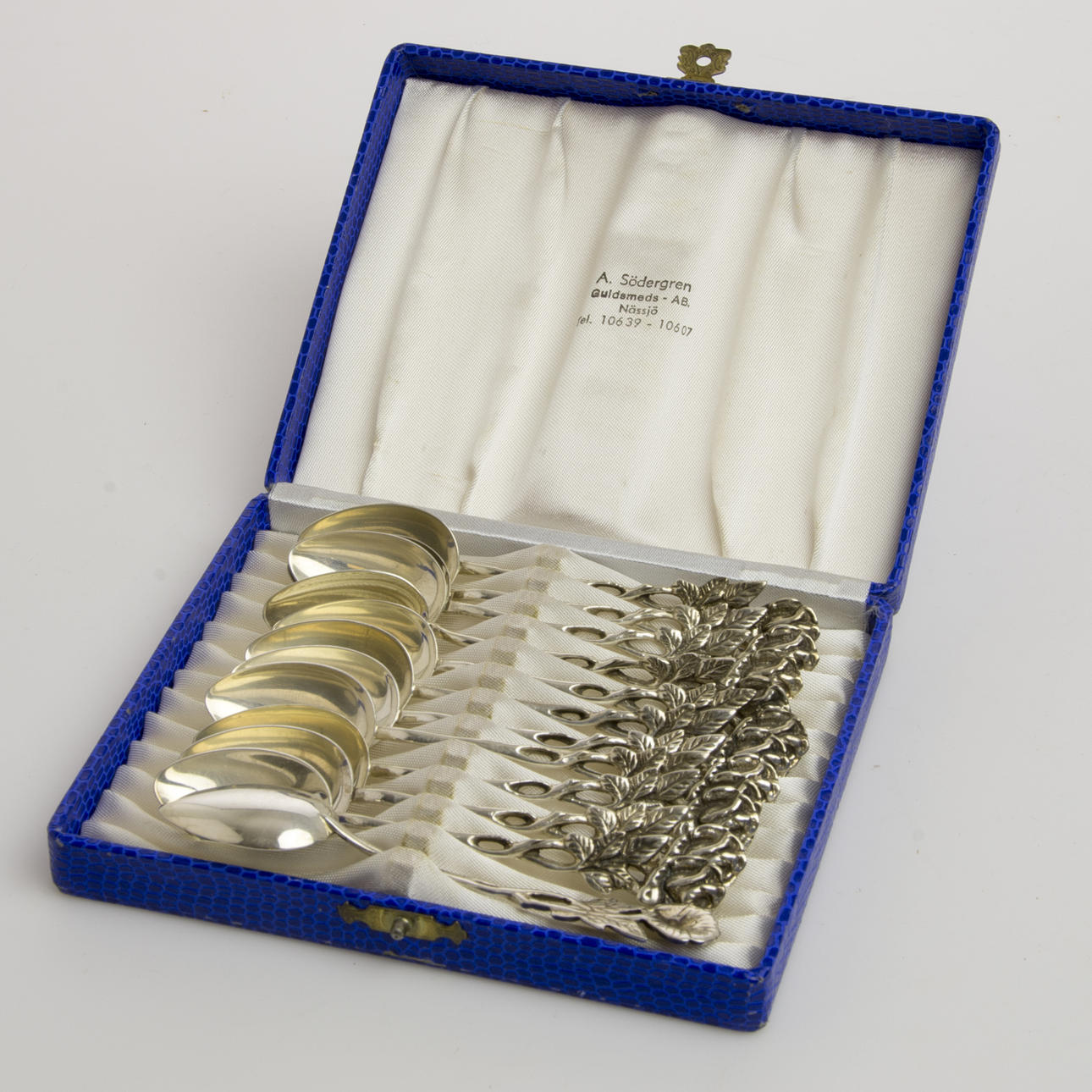 KAFFESKEDAR, 12 stycken i etui, "Rosen", silver.