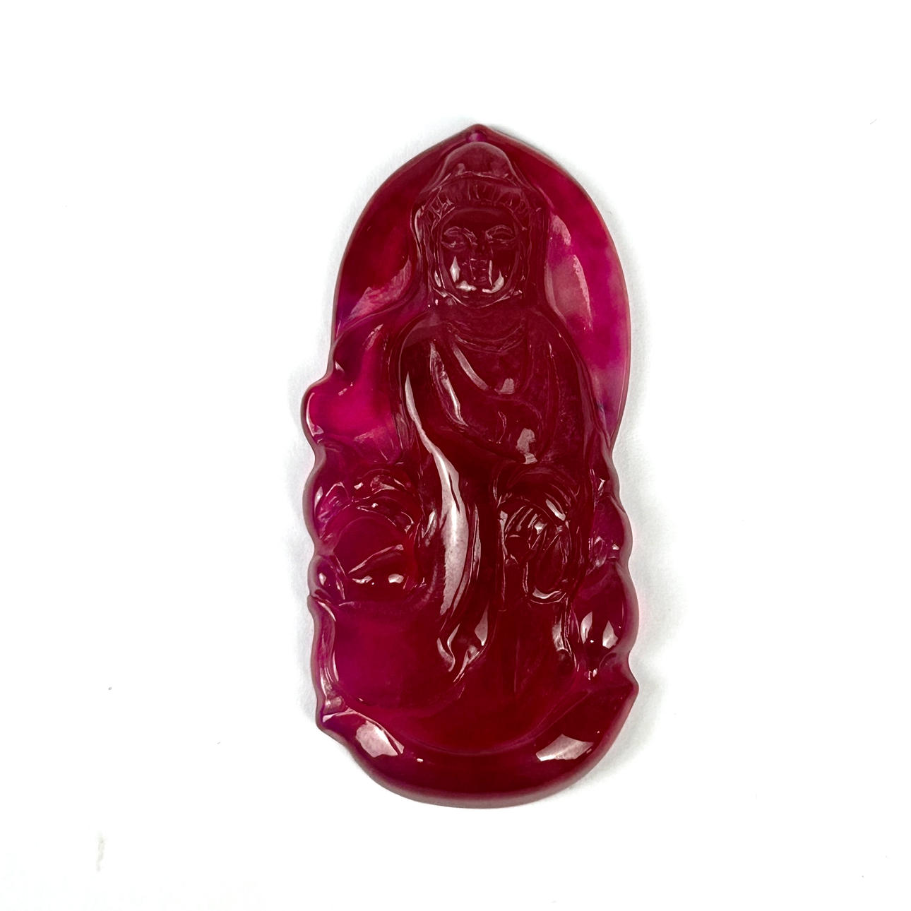 A CARVED PINK TOURMALINE PENDANT.