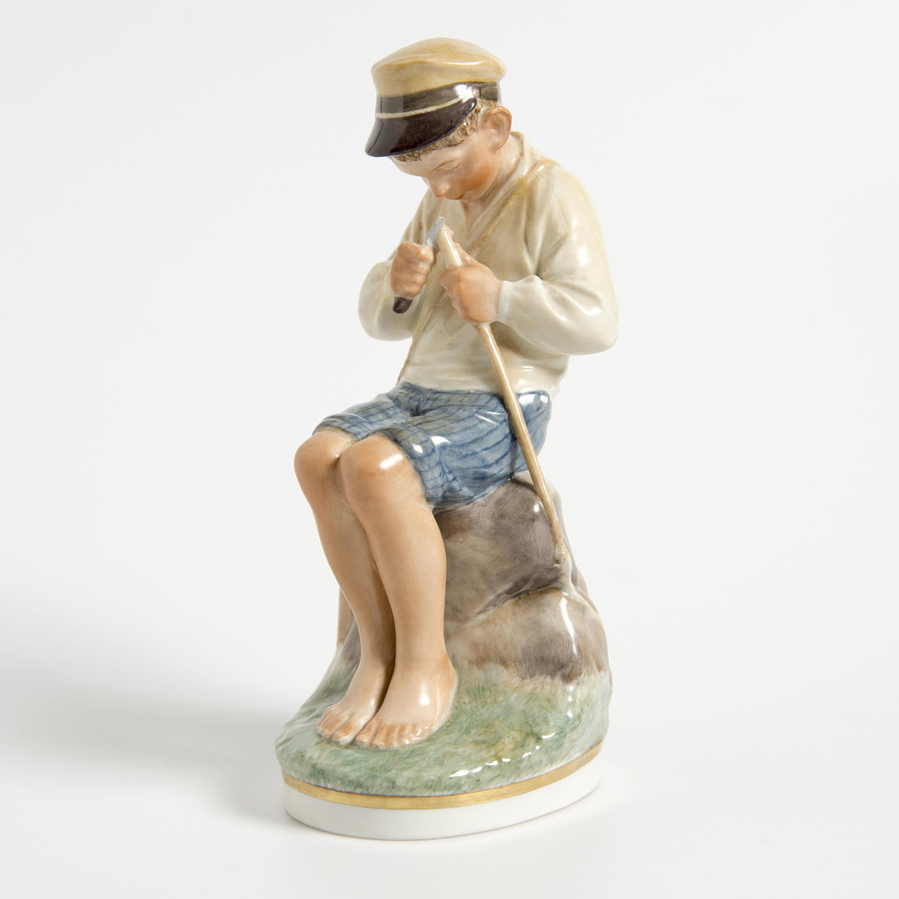 FIGURIN, täljande pojke, Royal Copenhagen.