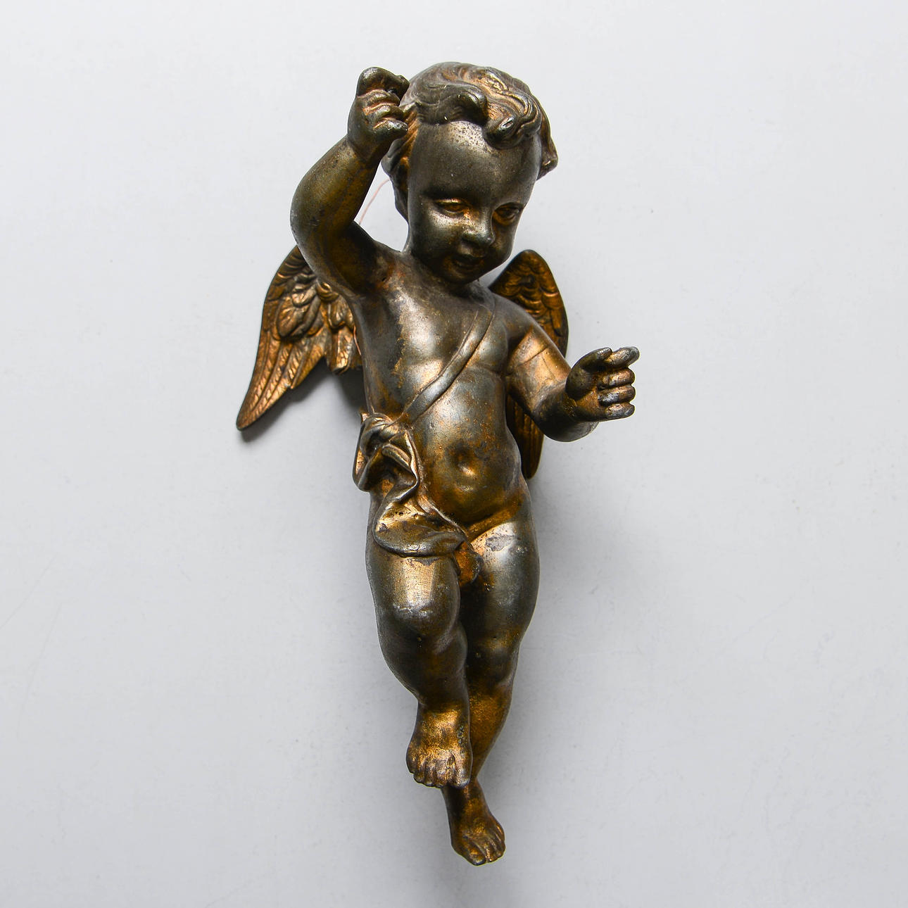Puttoskulptur, messing, 18./20. århundrede.