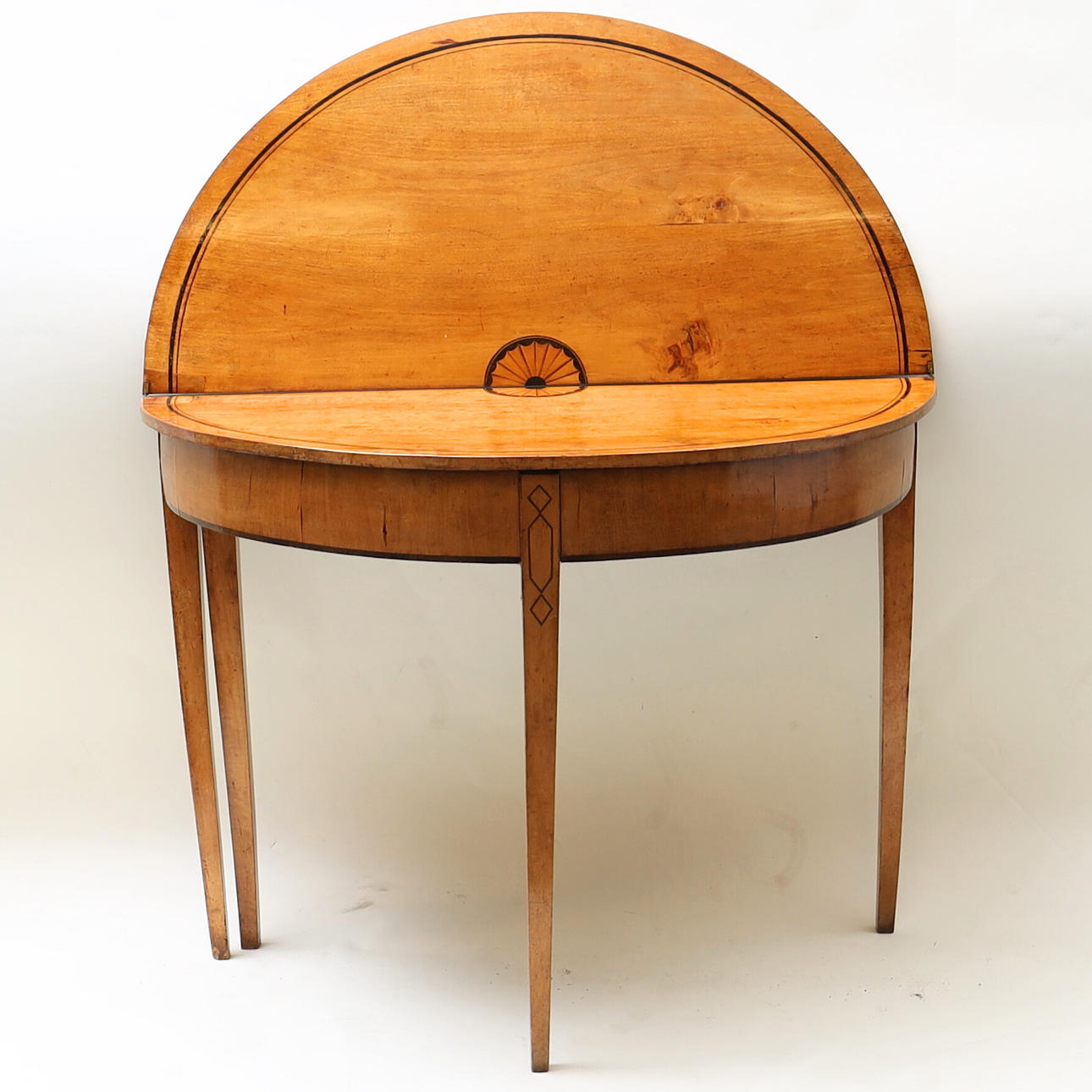 A folding table, England, George III 19th century.